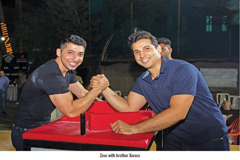 Zeus Zend Hits Gold In Arm Wrestling